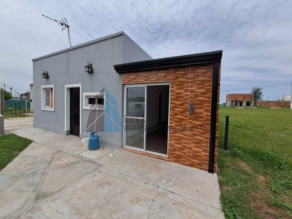 CASA 3 DORMITORIOS BARRIO PRIVADO LOMA ALTA